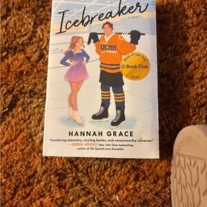 Anna Grace Icebreaker Novel with Orange and Black Accents